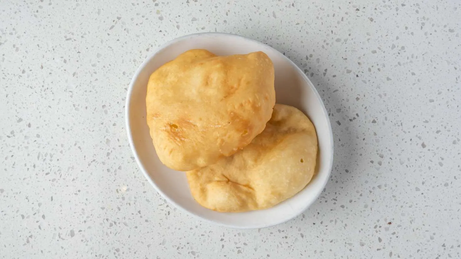 Bhatura - fluffy deep-fried Indian bread served with chole