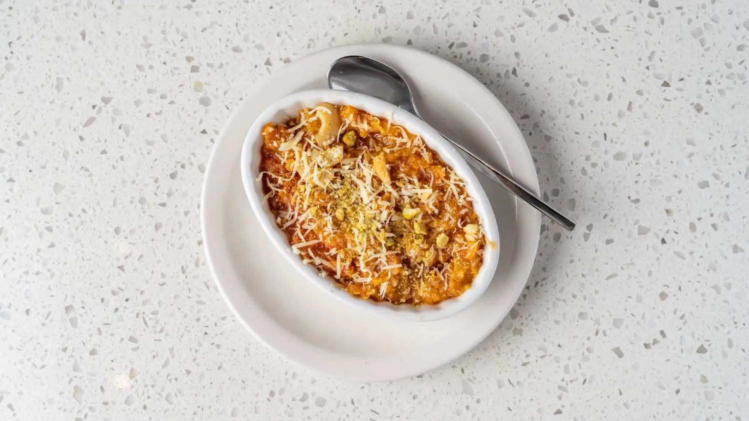 Gajar ka halwa - traditional carrot pudding with nuts and cardamom