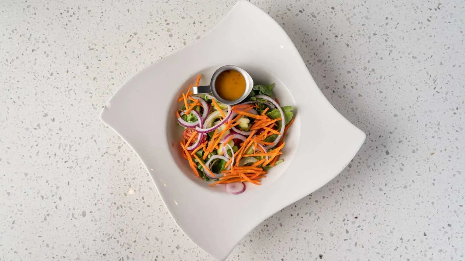 House salad - fresh mixed greens with Indian dressing