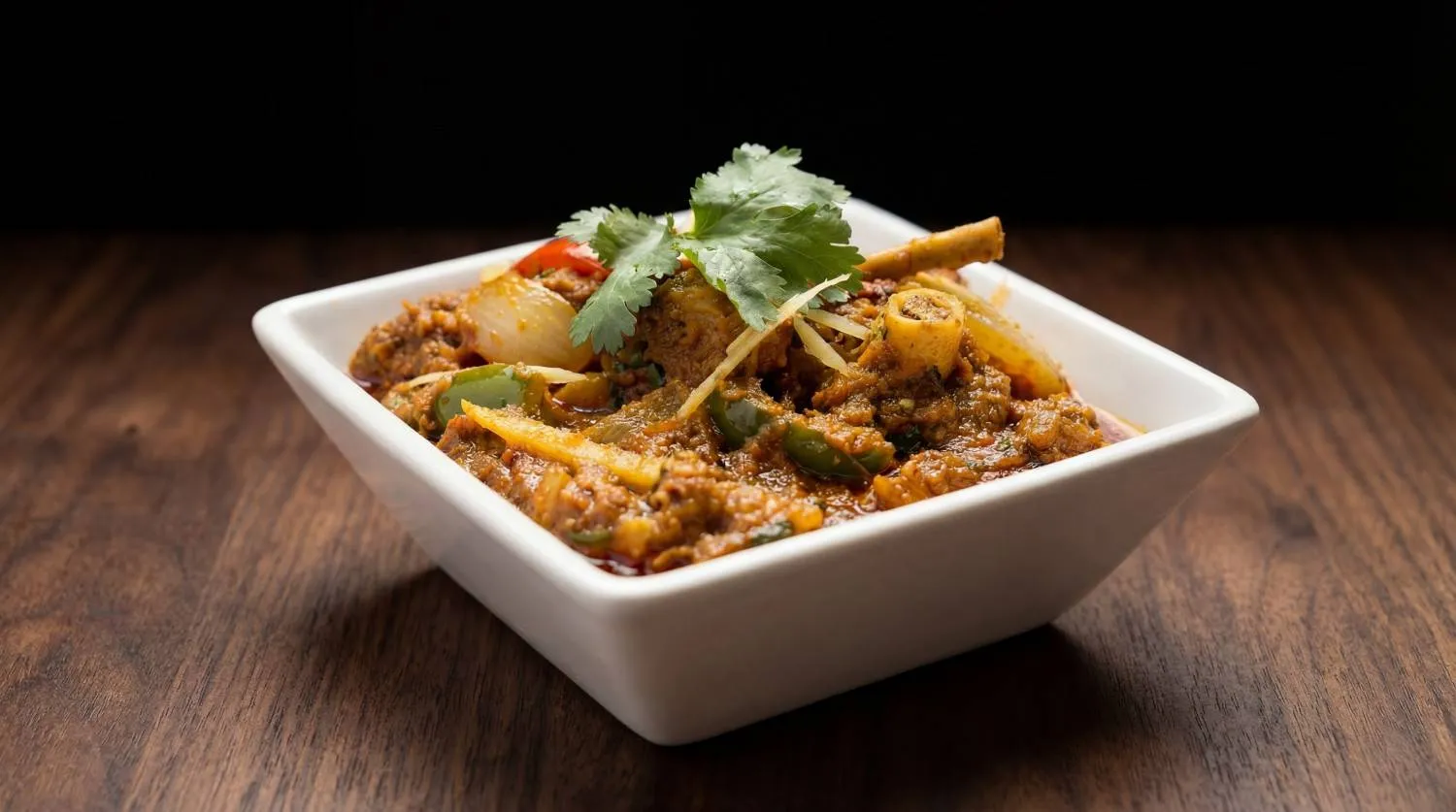 Kadai gosht - spicy lamb curry cooked in traditional Indian wok